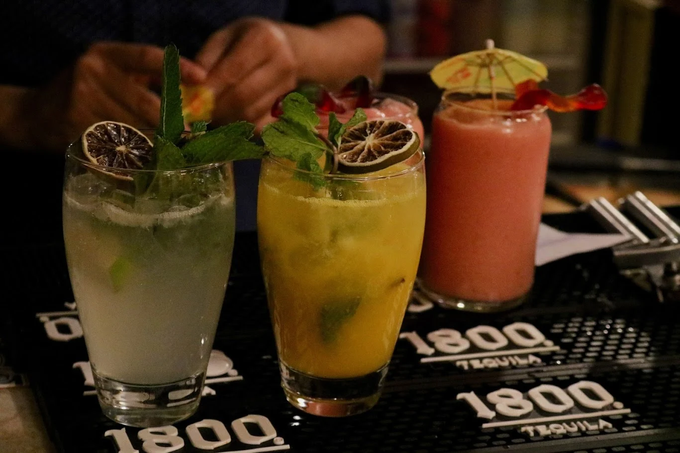Three colourful cocktails prepared at Hacienda’s bar