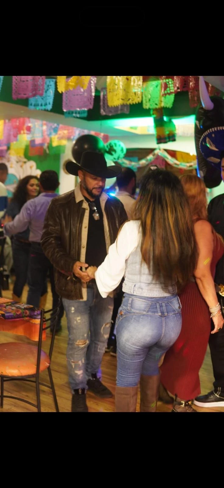 Guests dancing inside Hacienda Santa Teresa during a cantina night